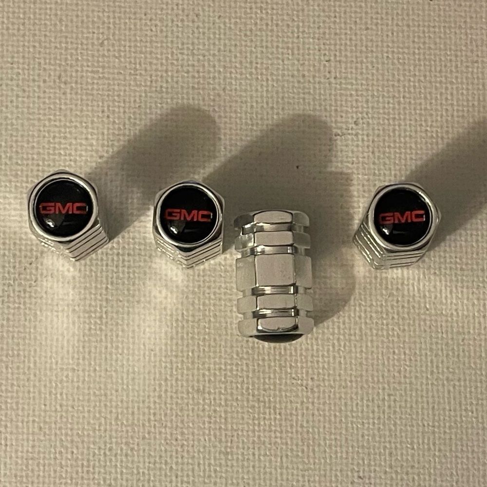 GMC Logo valve Stem caps in Silver set of 4 NWT